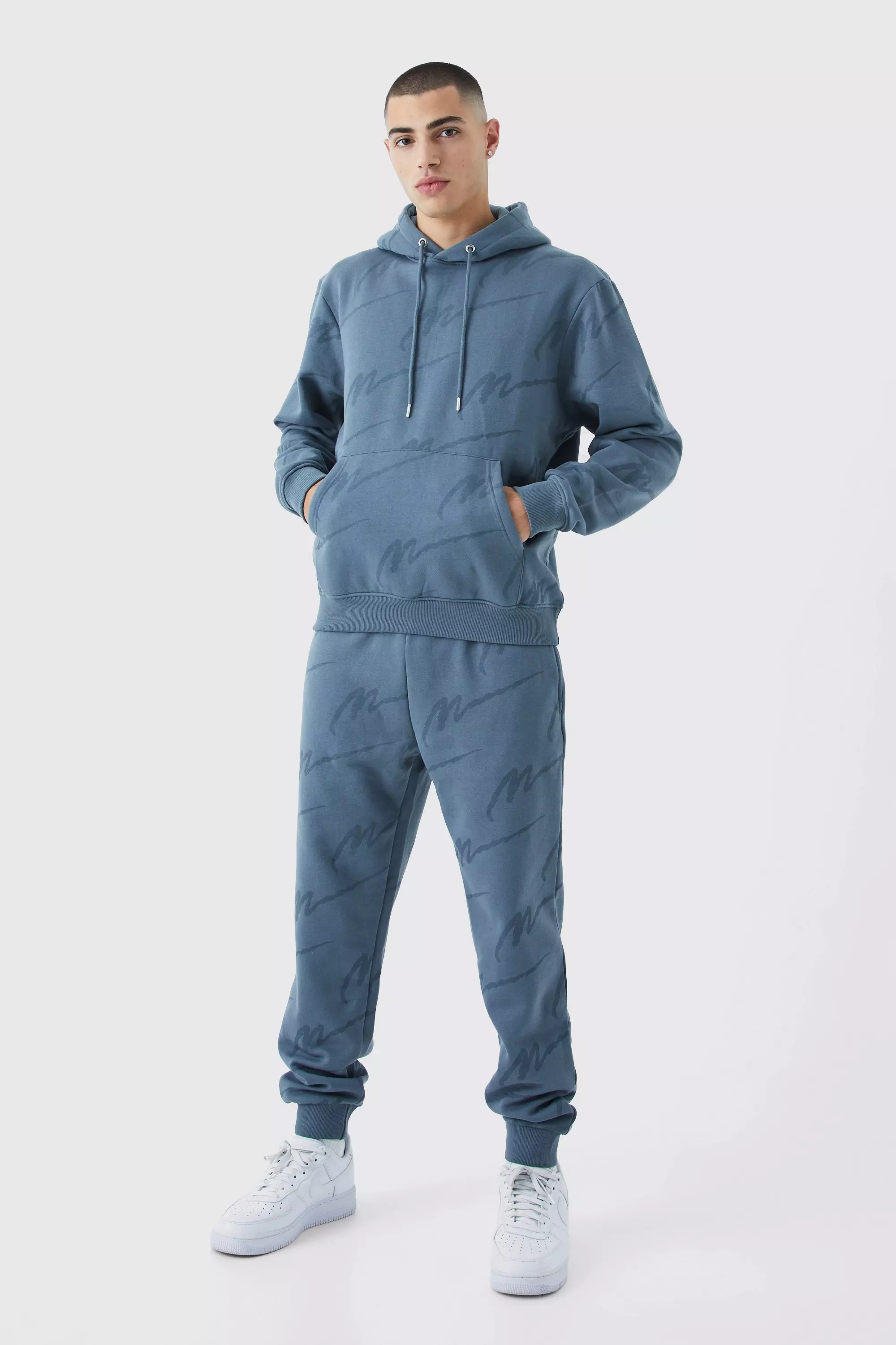 All over man printed hooded tracksuit hot sale